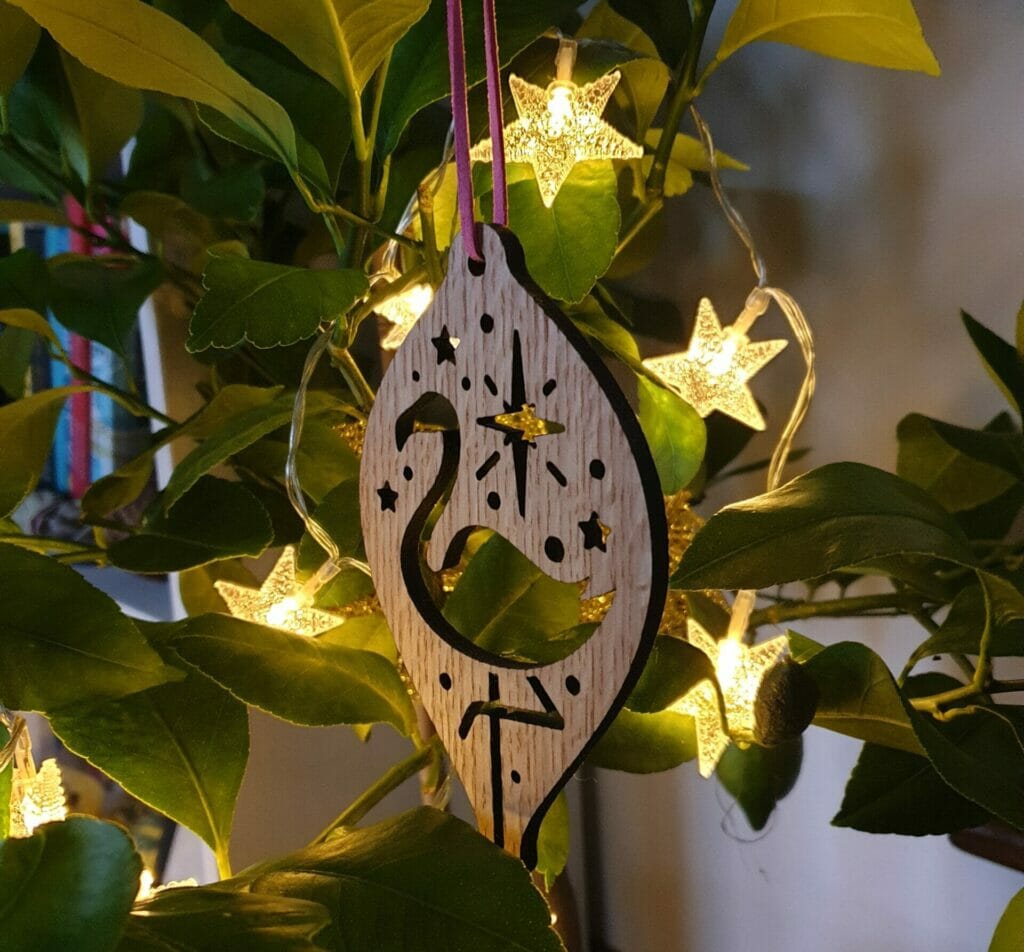 Wooden teardrop bauble with flamingo cut-out