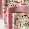 Flamingo and pink polka dot fabric